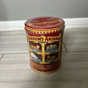 2 vintage animal cracker tins.